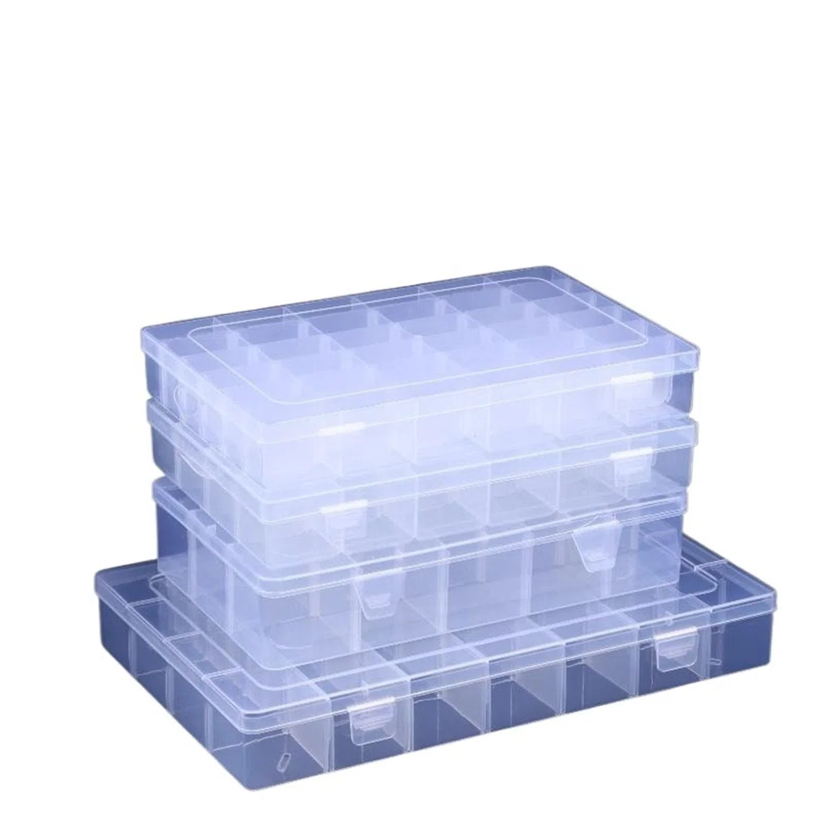 Caja con compartimentos de plástico transparente.
