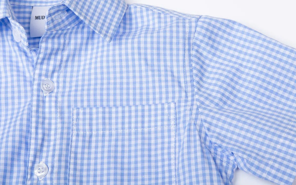Mud Kingdom Camisa de manga corta con botones para niños, cuello redondo, parte inferior redonda, plisada, casual, verano
