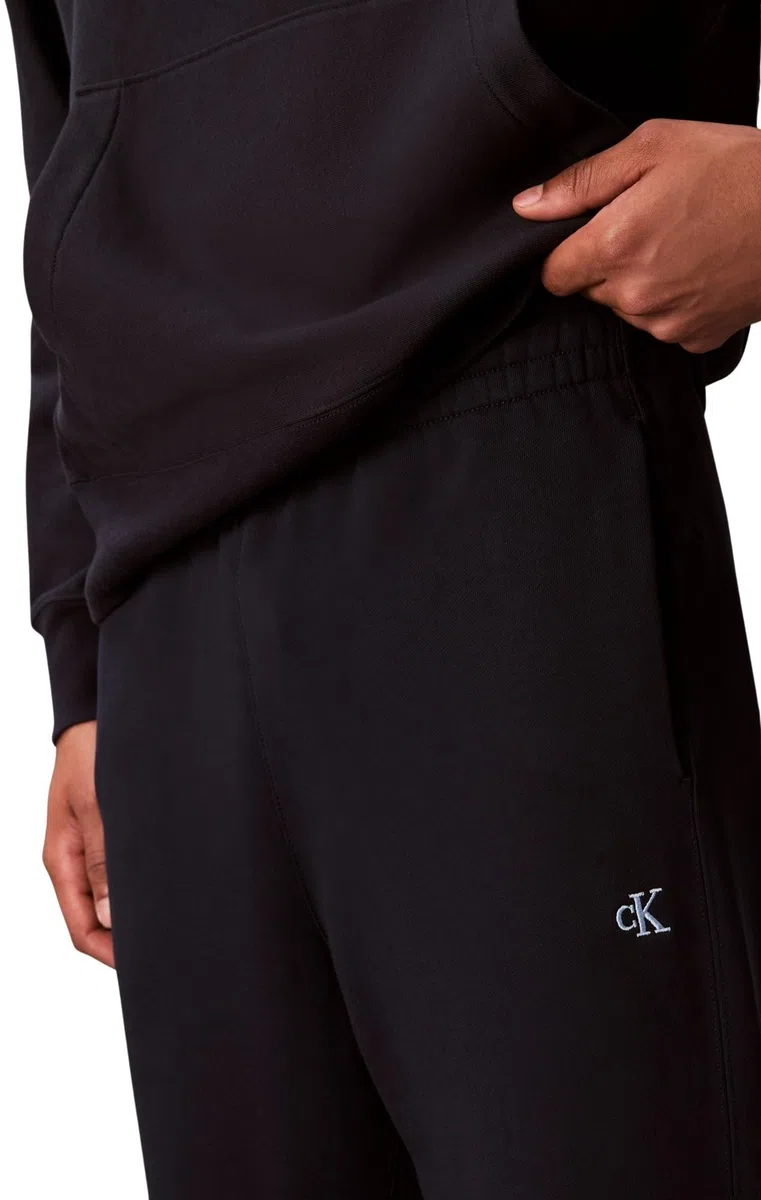 Calvin Klein Pantalón de chándal Hombre Terry Monogram con Bolsillo Trasero, Azul (Dark Sapphire), M